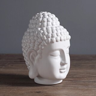 Statue de tête de bouddha blanche