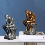 2 statues du penseur de rodin (dorée et argentée)