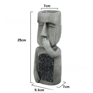 Statue de buste Moïa gris avec une main sur la bouche et du noir au niveau du torse