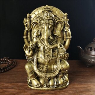 Statue de Ganesh couleur bronze assi sur un fauteuil
