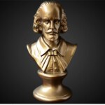 Sur fond noir, on voit une statue dorée représentant le buste de William Shakespeare.