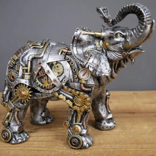 Statue industrielle éléphant en engrenages argenté et doré, posé sur une table en bois.