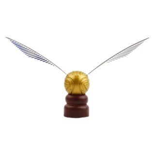 Statue Harry Potter vif d'or sur son socle en bois.