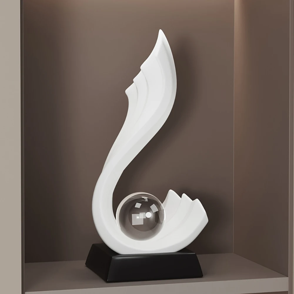 5866-itkc7w.jpg Statue en forme de vague blanche avec une boule transparente à sa base